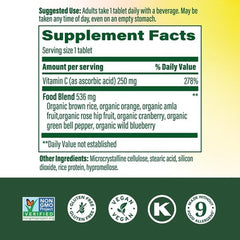 MegaFood Complex C bottle pour showing easy daily supplement routine.