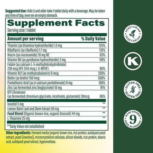 Close-up of MegaFood Kids B Complex tablets highlighting methylated B vitamins.