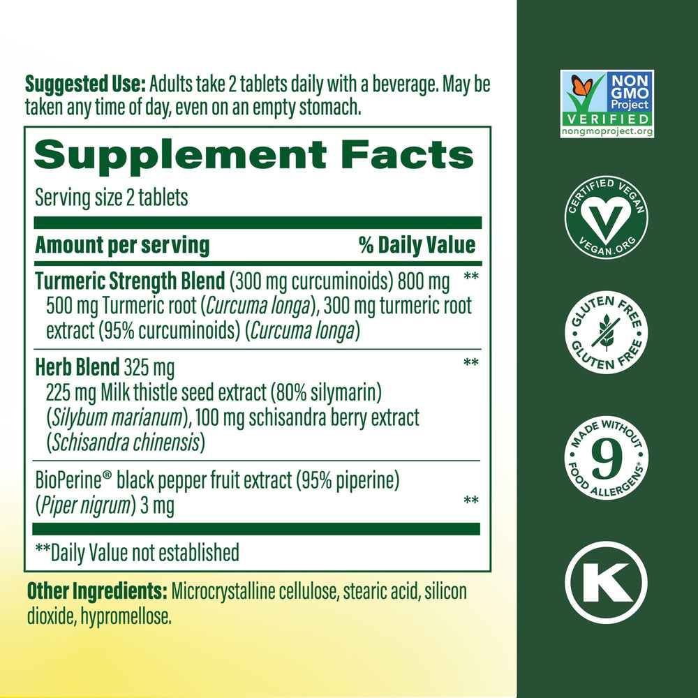 Close-up of MegaFood Turmeric Curcumin capsules illustrating the two-tablet daily serving
