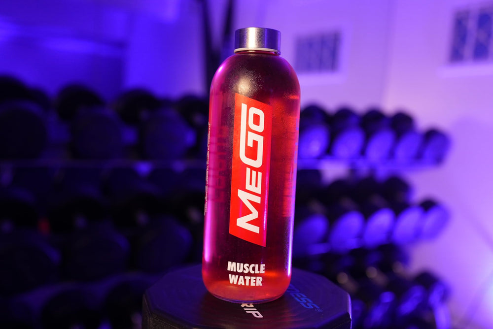 MEGO Muscle Water colorfully lit glass signals flavorful hydration during training.