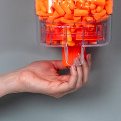 Mellows earplug dispenser features high-visibility color for quick checks.