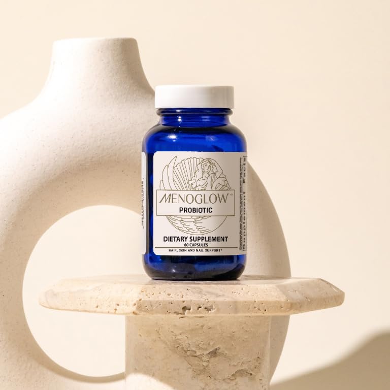 MenoGlow capsules beside a glass of water signaling a simple daily ritual.