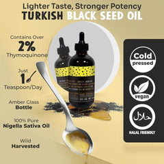 Close-up of MerryTes Advanced Black Seed Oil liquid with amber color for everyday use.