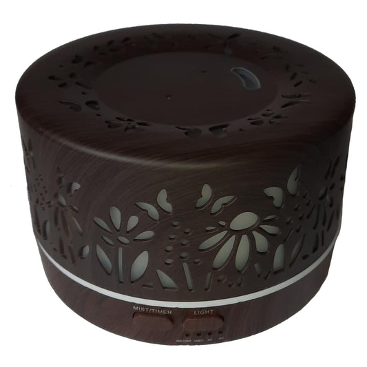 mEssentials Wild Essentials diffuser top view highlighting moon and star design and ambient lighting