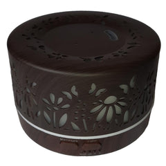 mEssentials Wild Essentials diffuser top view highlighting moon and star design and ambient lighting