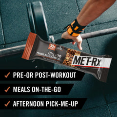 MET-Rx Big 100 Peanut Butter Pretzel bar in gym bag for workouts
