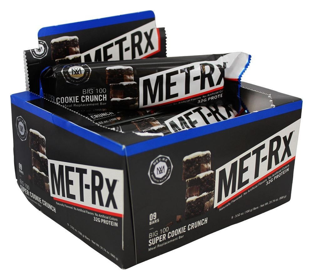 MET-Rx Colossal Cookie Crunch bars shown with a gym bag for on-the-go snacking.