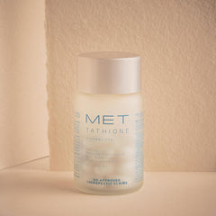 Met Tathione capsules close-up showing easy-to-swallow softgels.