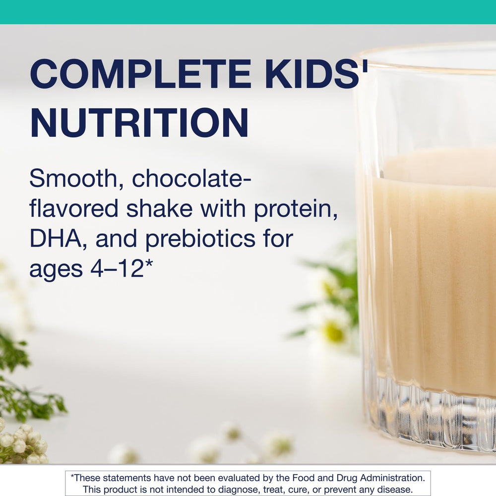 MetaKids scoop beside a glass shows easy mixing for busy mornings.