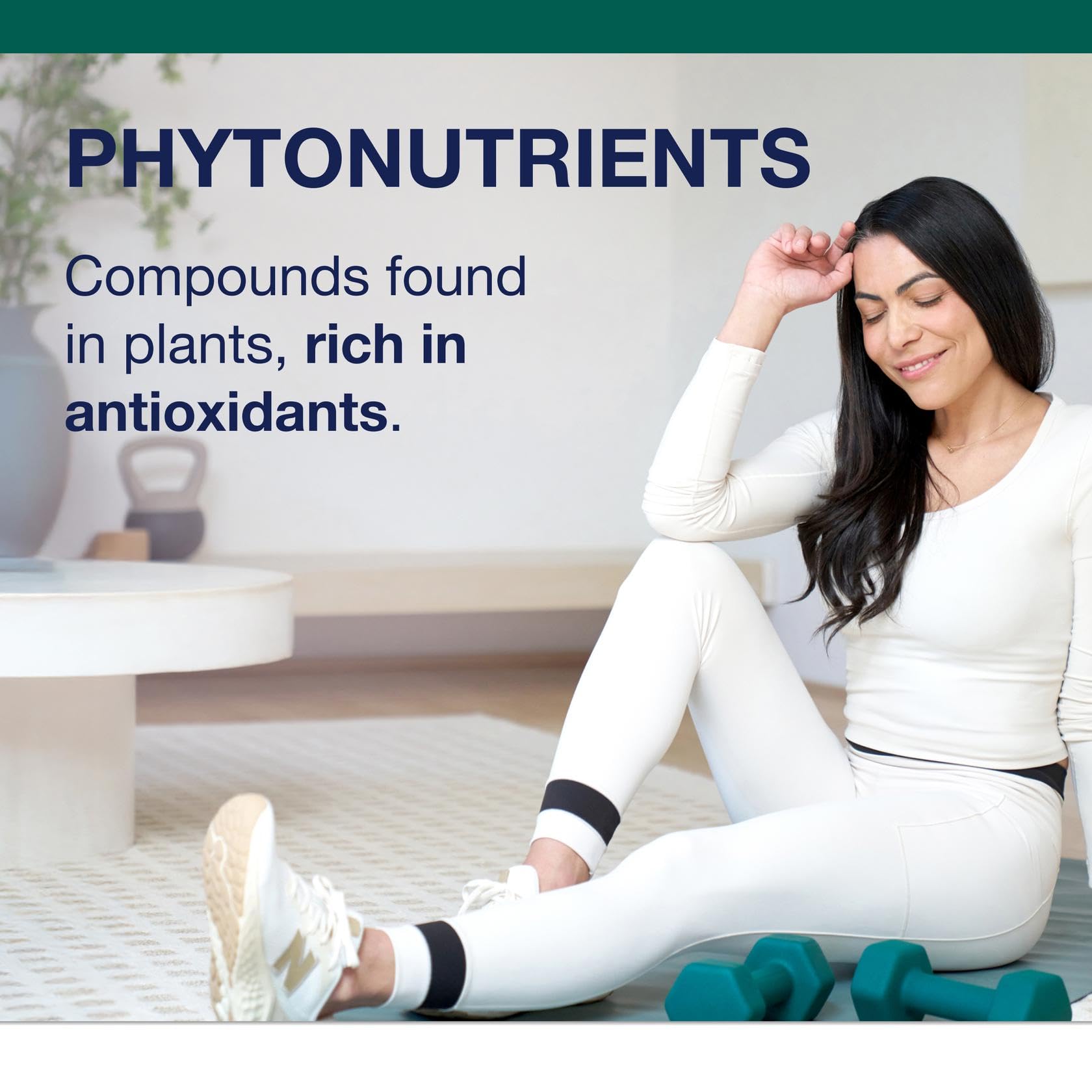 Metagenics PhytoMulti bottle on desk for daily routine