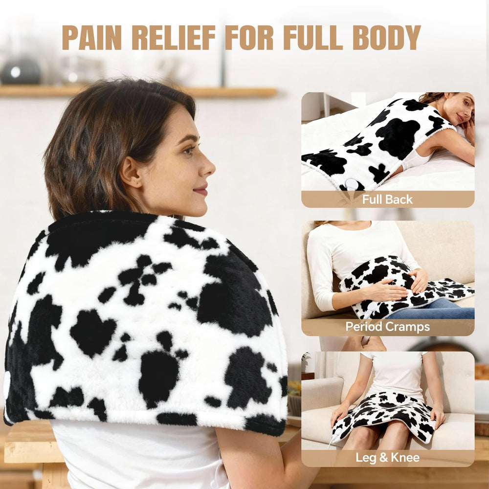 MewMix cow-print heating pad back view with sherpa fleece for plush comfort.