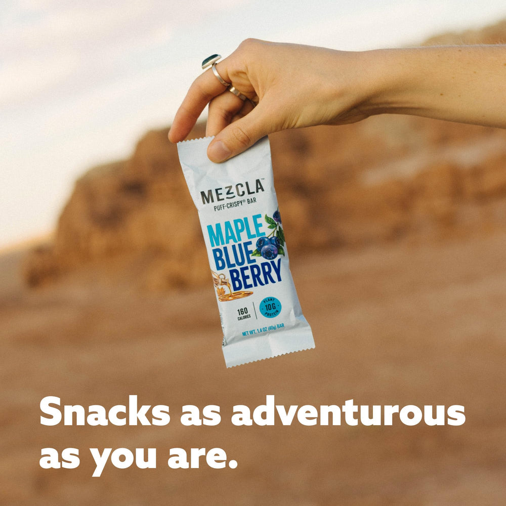 Mezcla snack in travel scenario for quick protein on the go.