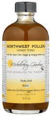 Mickelberry Gardens Pollen Honey Tonic being poured into a glass for easy daily use.