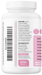 Micro Ingredients bottle next to glass reinforces premium daily wellness routine