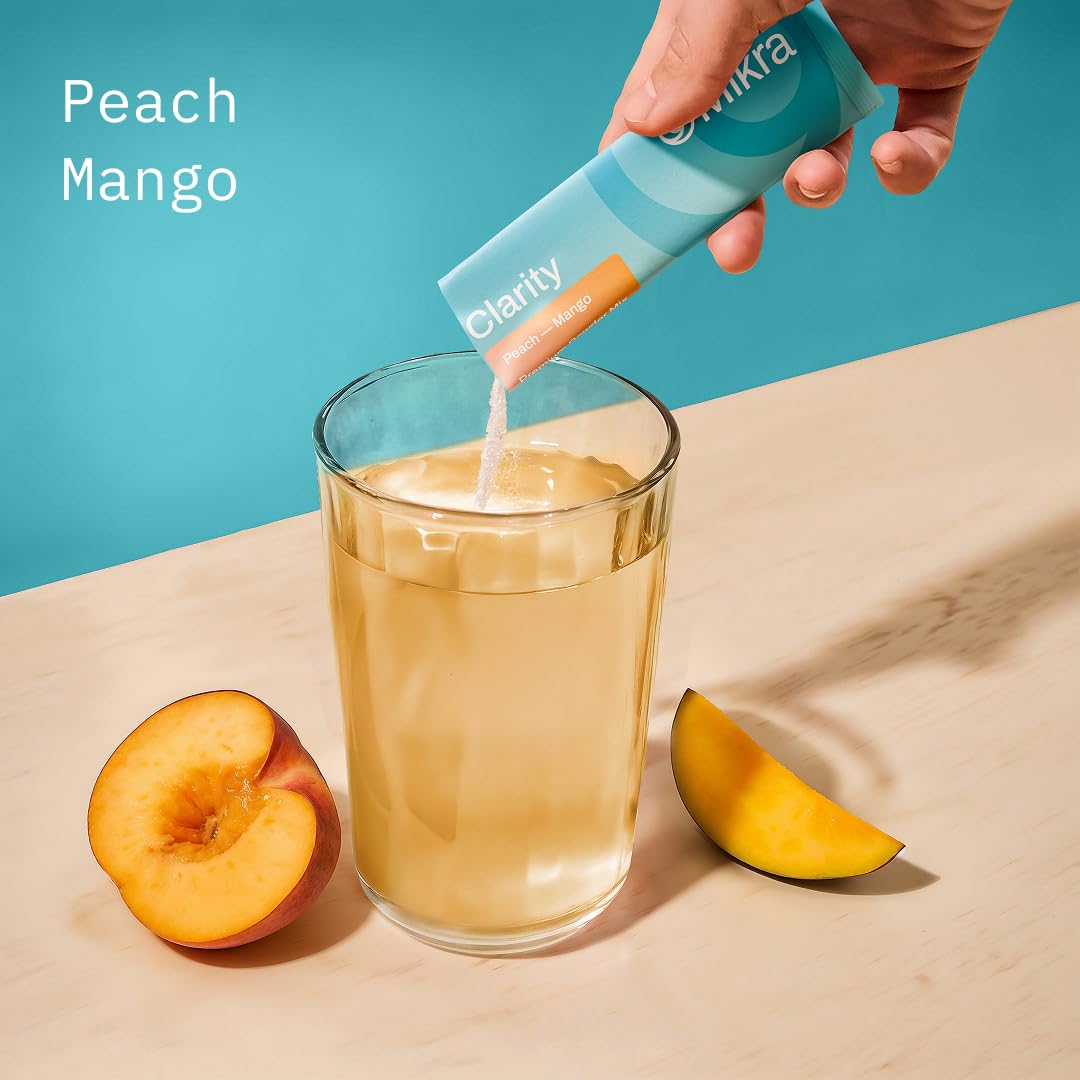 Mikra Clarity ready drink in glass supports steady energy for work.