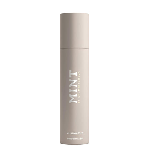 MINT by Dr. Mintcheva mouthwash bottle front view highlighting whitening benefits.