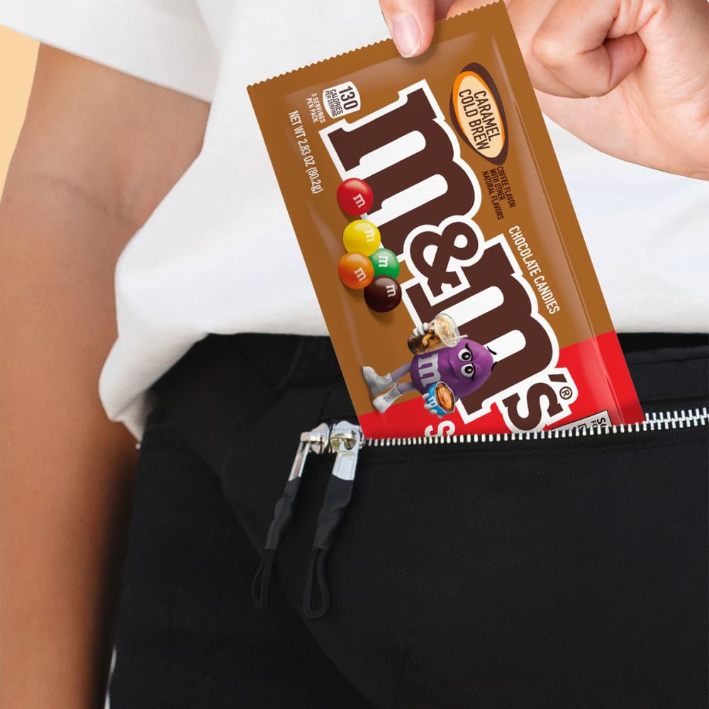 M&M'S Caramel Chocolate candy buffet setup with colorful presentation