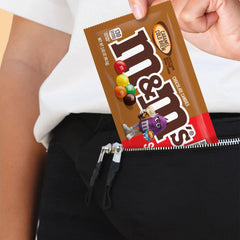 M&M'S Caramel Chocolate candy buffet setup with colorful presentation