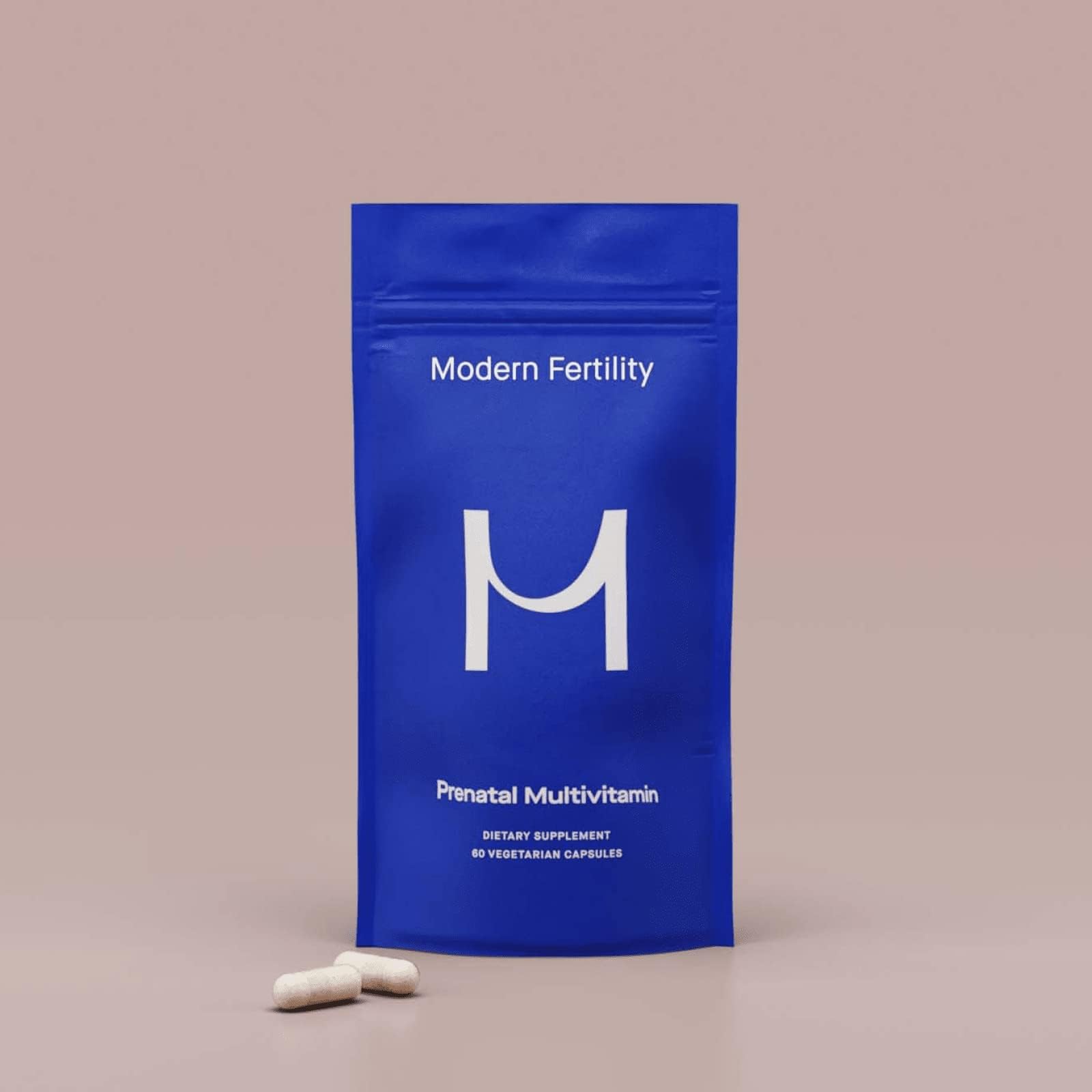 Modern Fertility Prenatal Multivitamin on kitchen counter during routine.