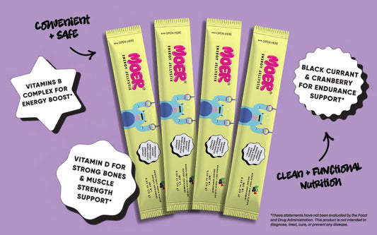 MOER Energy JellyStix Fruit Punch Stick being chewed for quick, caffeine-free energy