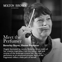 Molton Brown 21oz candle in glass jar provides long-lasting scent.