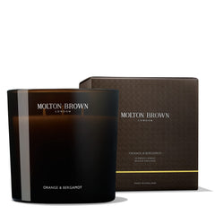 Molton Brown Orange & Bergamot triple-wick candle adds bright citrus ambience.