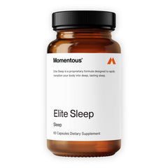 Momentous Elite Sleep Capsules bottle on nightstand, promoting a calm nighttime routine.