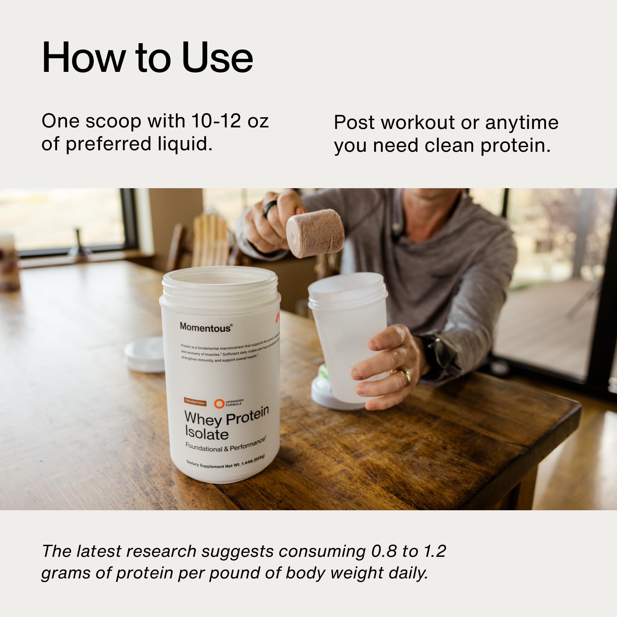 Momentous Essential Grass-Fed Whey dissolving in milk for smooth texture