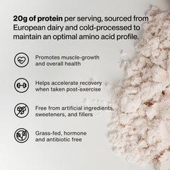 Momentous Essential Grass-Fed Whey shake in glass showing strawberry blend