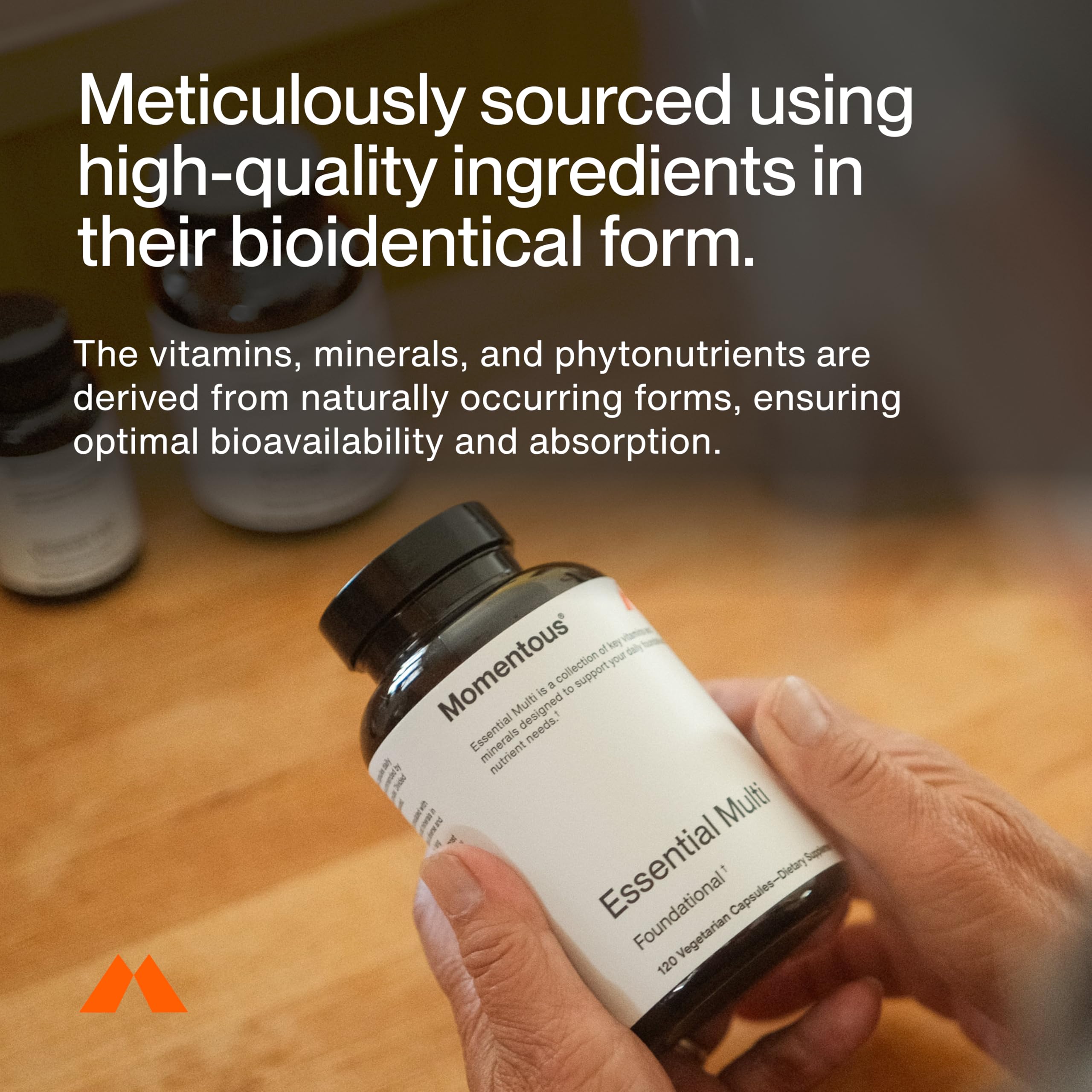 Momentous Essential Multivitamin bottle with broccoli seed phytonutrients emphasizes antioxidant support.