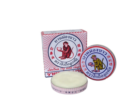 MONKEY HOLDING PEACH Balm ingredients close-up: eucalyptus oil, clove, cinnamon aroma