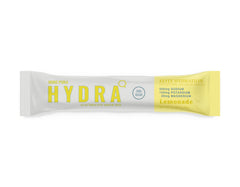 Mons Pura Hydra Lemonade glass being stirred for refreshing hydration during workouts