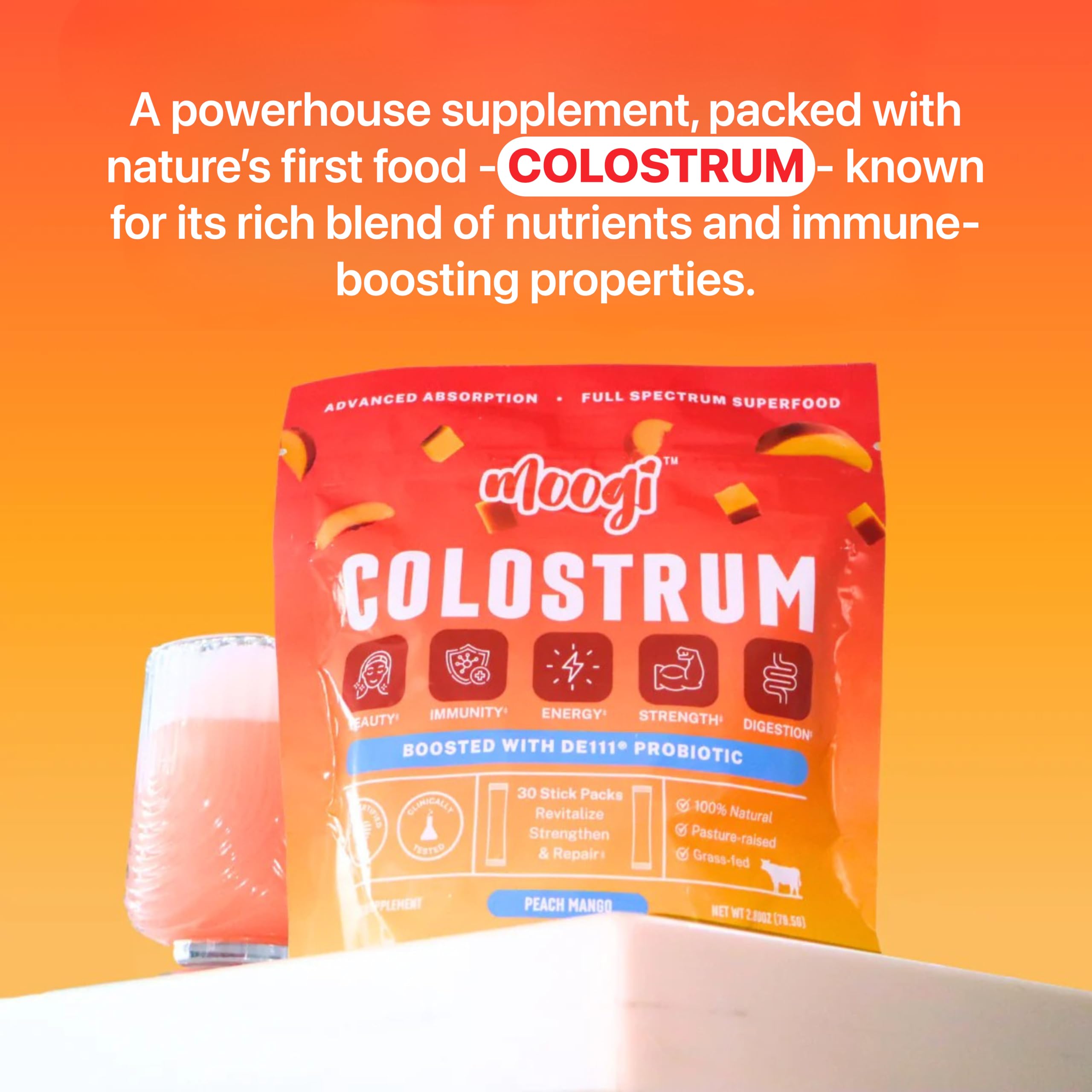 Moogi Peach Mango stick-pack dissolving in water for easy mix.