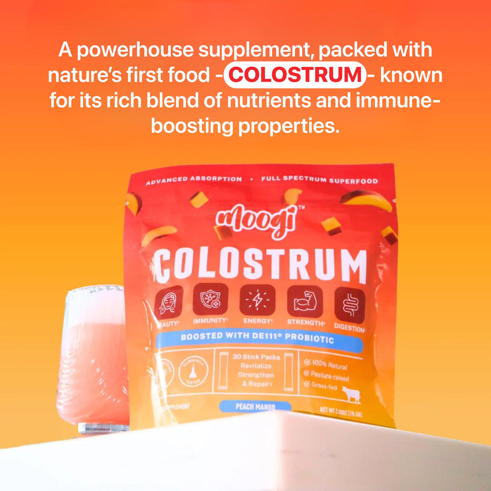 Moogi Peach Mango stick-pack dissolving in water for easy mix.