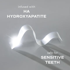 MOON strips dissolving on teeth in about ten minutes for quick whitening