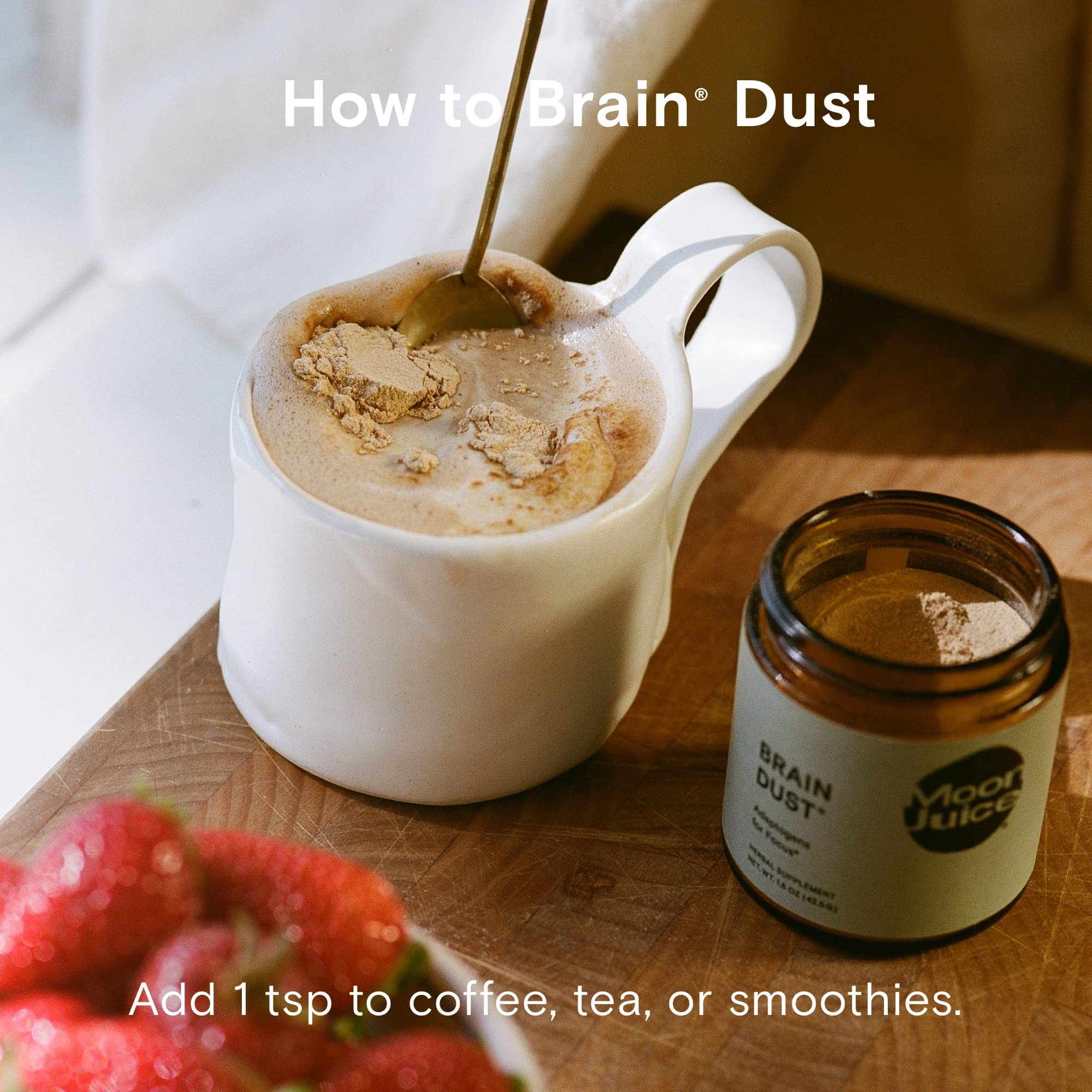 Moon Juice Brain Dust tea-cup spotlight hints at versatile usage in beverages and routines.