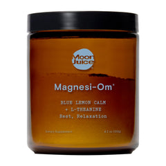 Moon Juice Magnesi-Om bottle label highlights chelated magnesium blend for calm support.