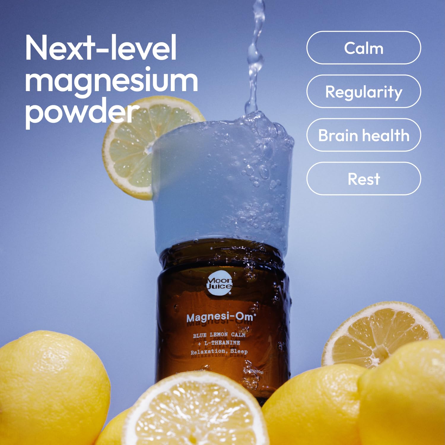 Moon Juice Magnesi-Om scoop beside jar for easy portioning and regular use.
