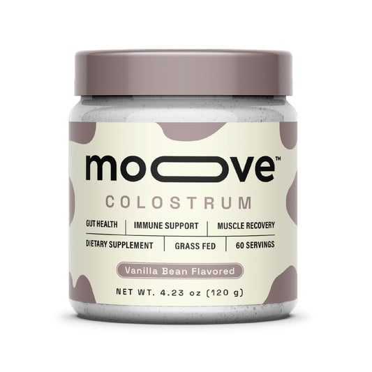 MOOVE bovine colostrum powder with vanilla bean for a smooth immune-supporting beverage.
