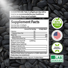 Mother Nature Organics black seed oil capsules being poured for easy daily use