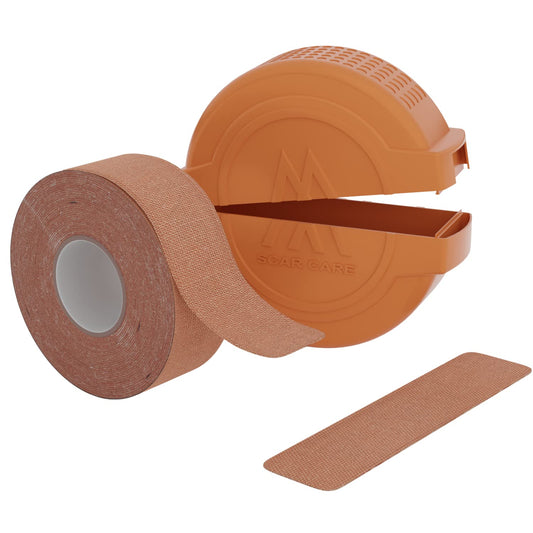 Motivo Scar Care Scar Tape roll in tan color for discreet scar management.