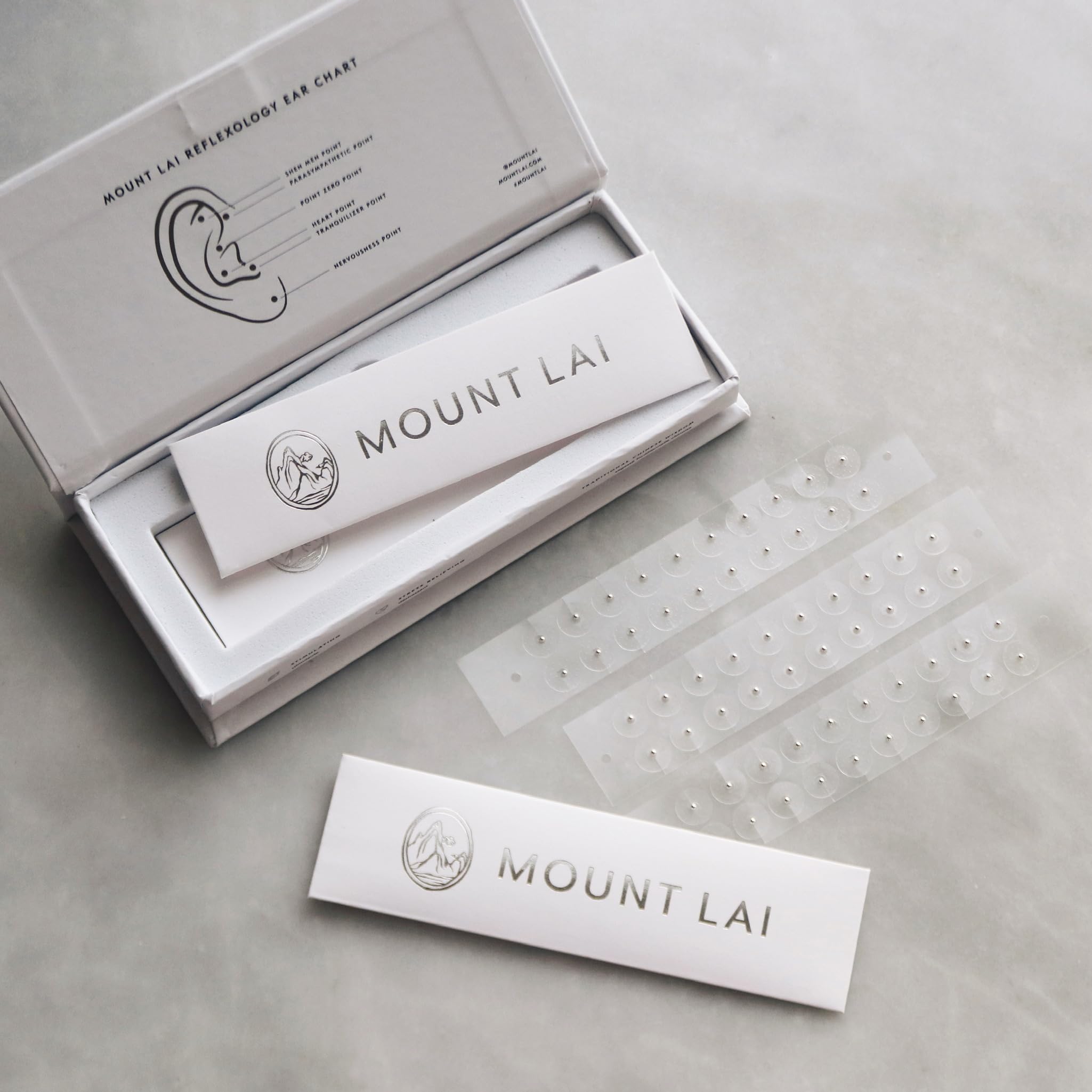 Mount Lai ear seeds sheet close-up showing peel-and-place method.