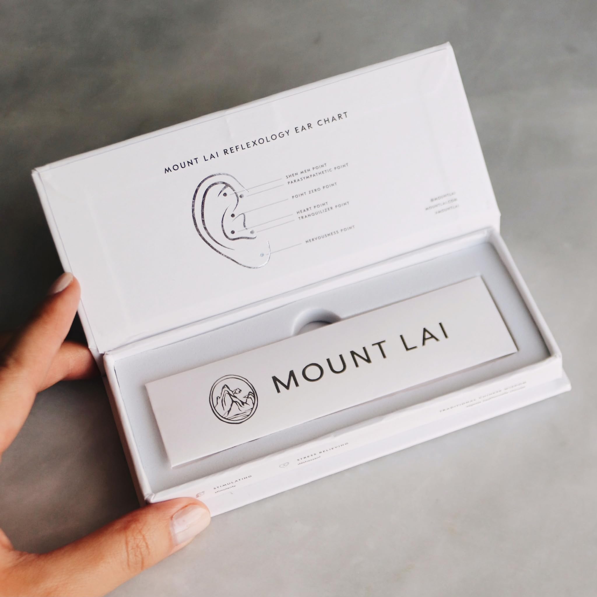 Mount Lai relaxation with ear seeds during daily routine.