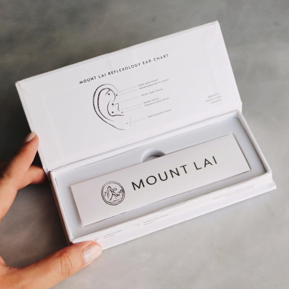 Mount Lai relaxation with ear seeds during daily routine.