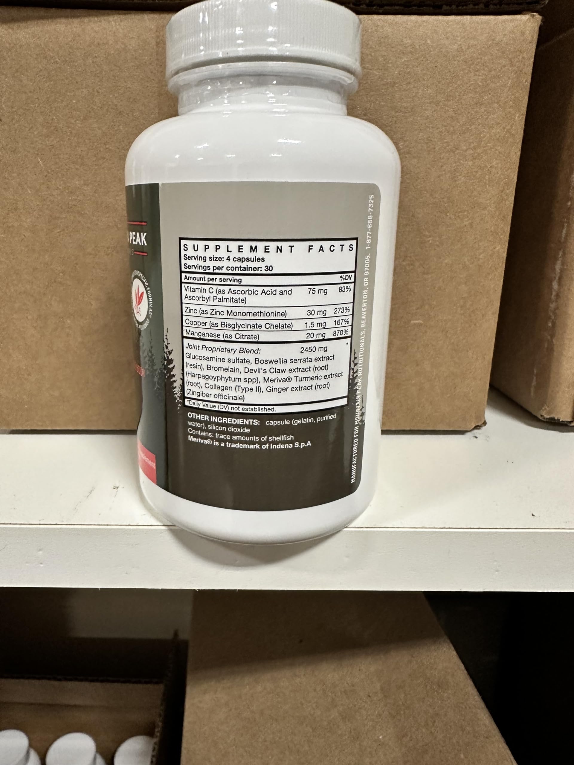 Mountain Peak Joint Formula bottle beside healthy foods signifying daily intake.
