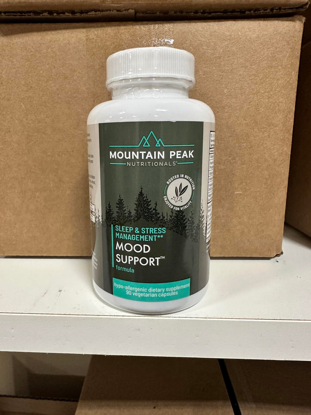 Mountain Peak Mood Support jar with capsules demonstrates allergen-friendly, vegetarian capsules.
