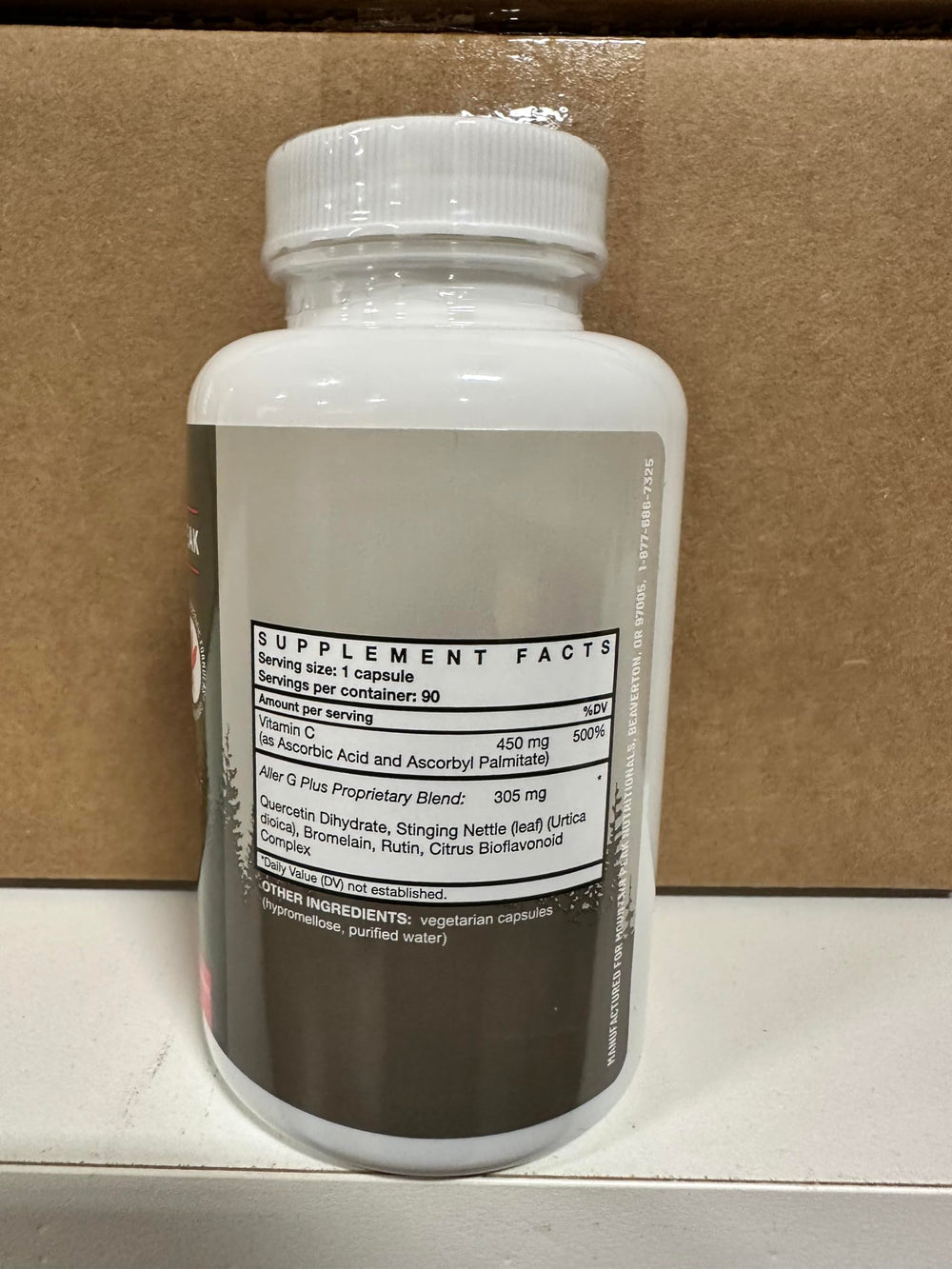 Health symbol with Aller G Plus packaging.