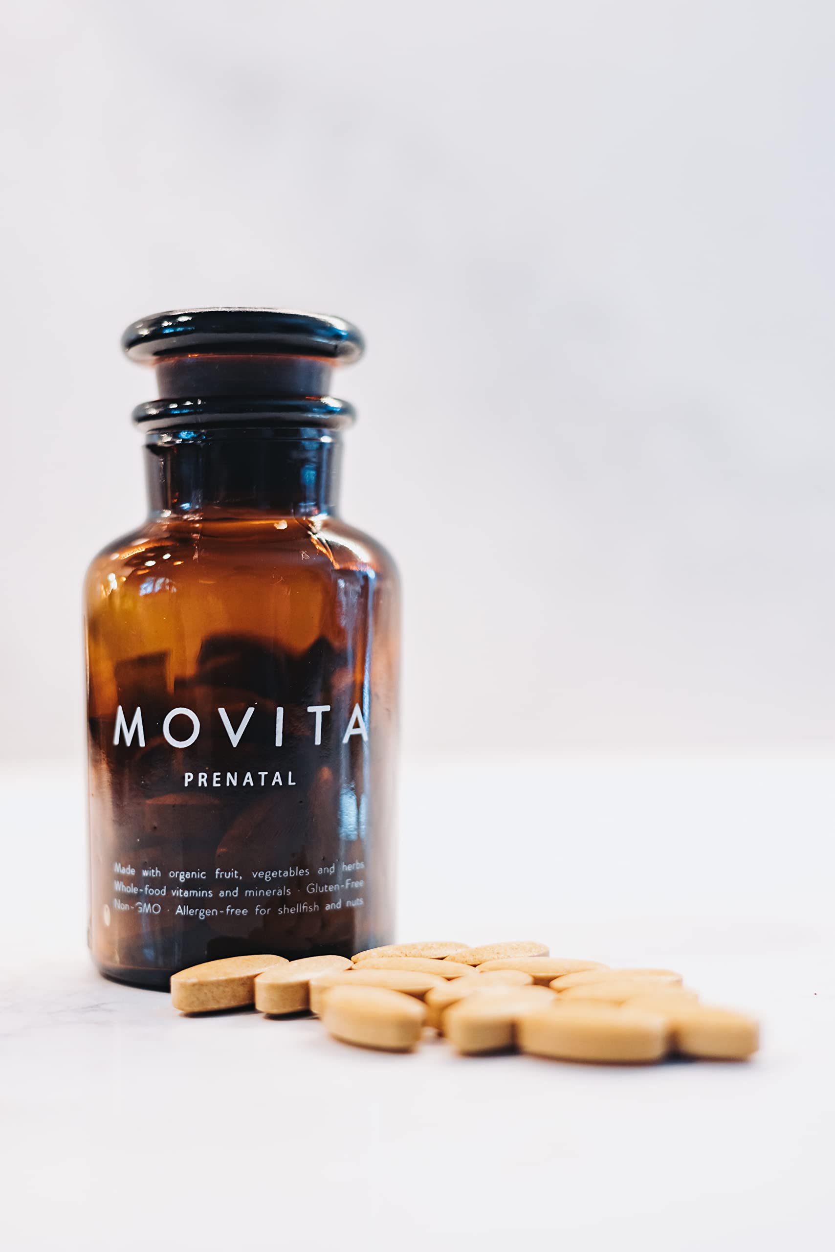 Movita Prenatal Multivitamin folate and iron icons underline essential nutrient foundations.