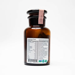 Movita Prenatal Multivitamin label closeup highlights organic ingredients and transparency.