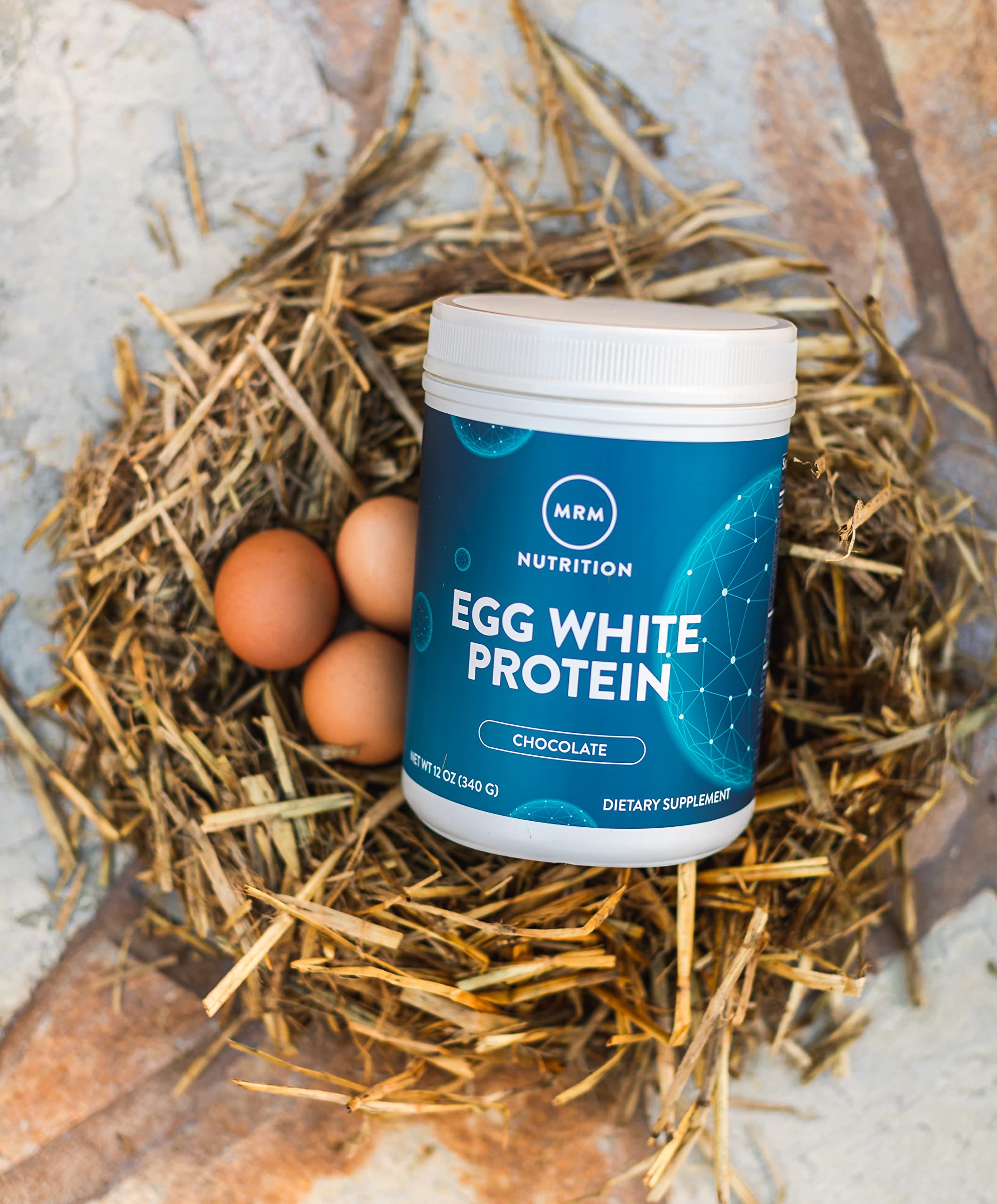 MRM Egg White Protein Chocolate mixing bowl with powder for a shake